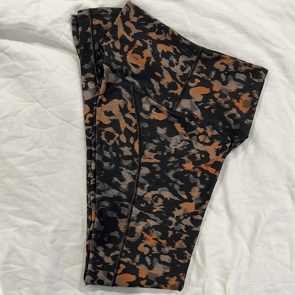 Women’s Ultra High-Waisted Leggings in color Wild Camo with Inner Front Pocket. - Picture 3 of 3